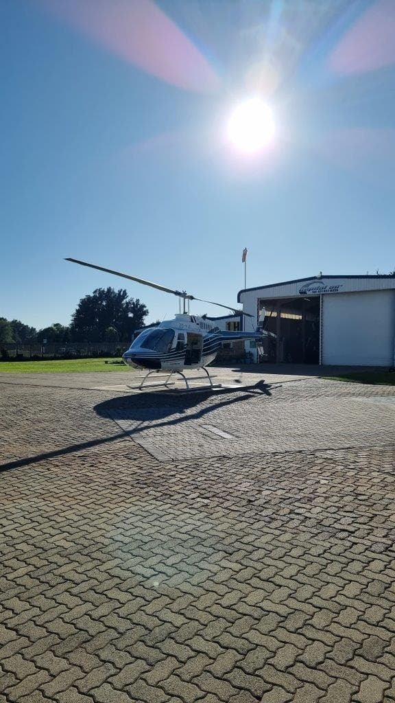 Helicopter on a helipad on a sunny day